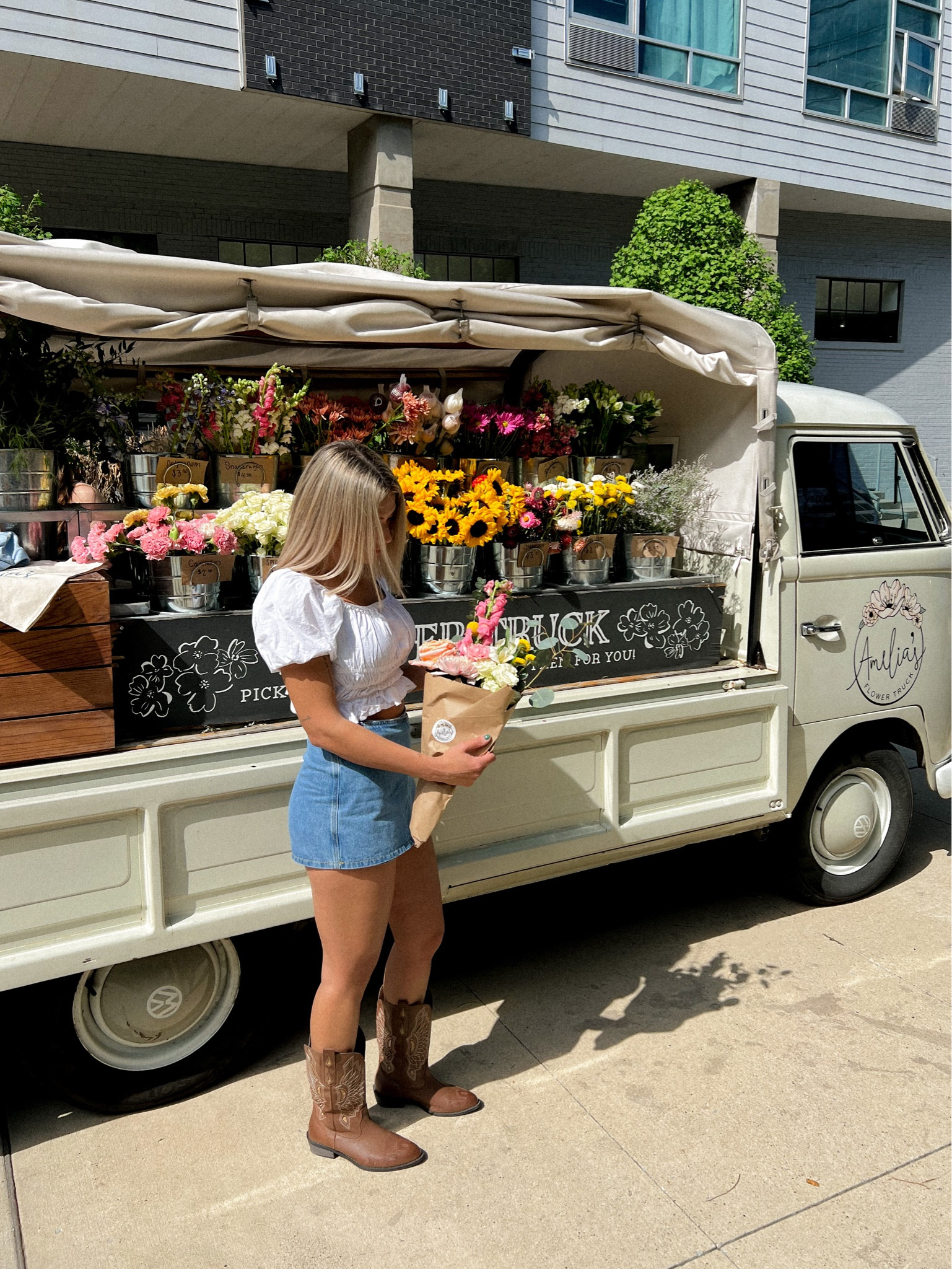 Revolve outfit white crop top with denim skort at the Amelia’s flower truck in Nashville TN in the gulch 

#LTKsalealert #LTKunder100 #LTKstyletip