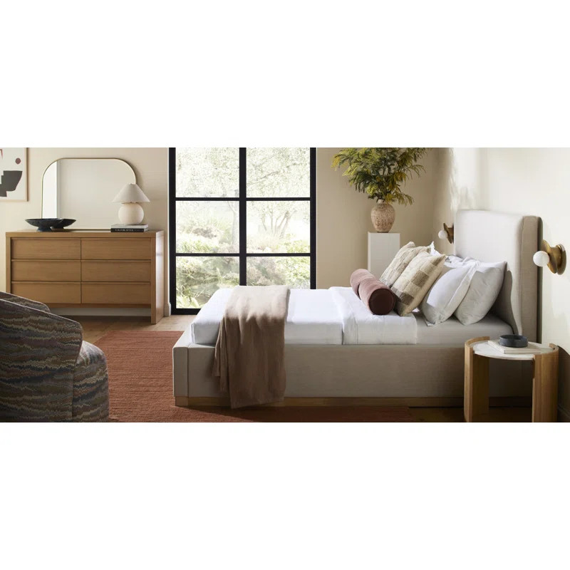 Delpha Grounded Upholstered Wood Base Bed | Wayfair North America