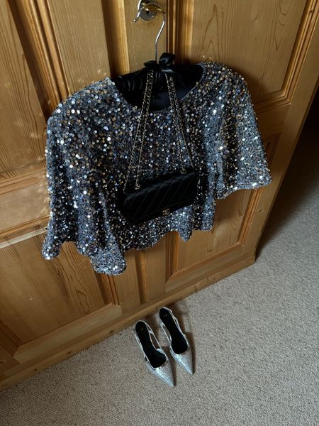 glitter for new year’s eve - what else?! ✨ in love with my pieces from Maje Paris. Pairing this festive sequin top with comfortable slingback pumps in silver. I took size 1 for the top and my usual size for the shoes (38). My satin Chanel bag is the perfect cherry on top. 🥂
Happy New Year everyone!

#LTKparties #LTKHoliday #LTKshoecrush