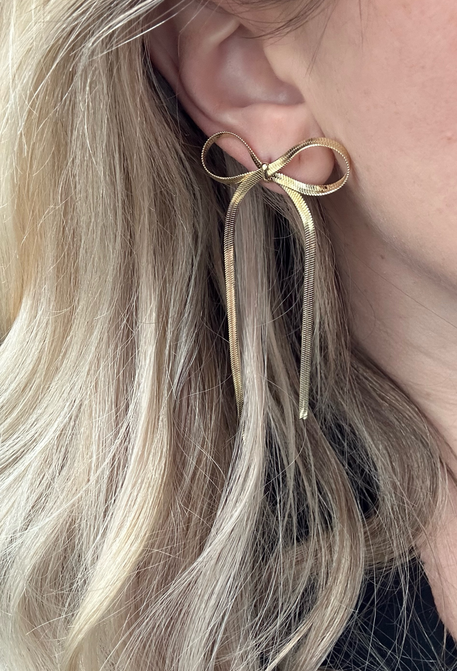 The cutest dainty bow earringshow

#LTKstyletip #LTKfindsunder50 #LTKSeasonal