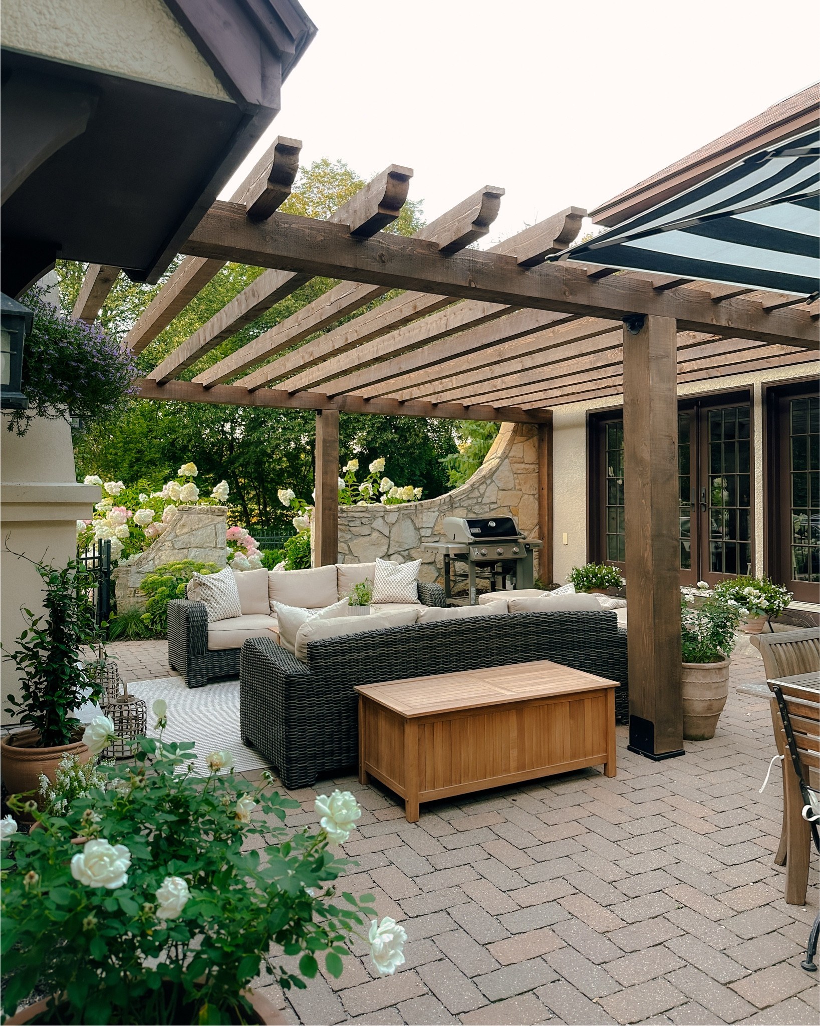 Outdoor patio. Read more about this transformation on my blog at www.patticakewagner.com for details on the fireplace build and pergola. Search “patio”

#LTKSeasonal #LTKSpringSale #LTKHome