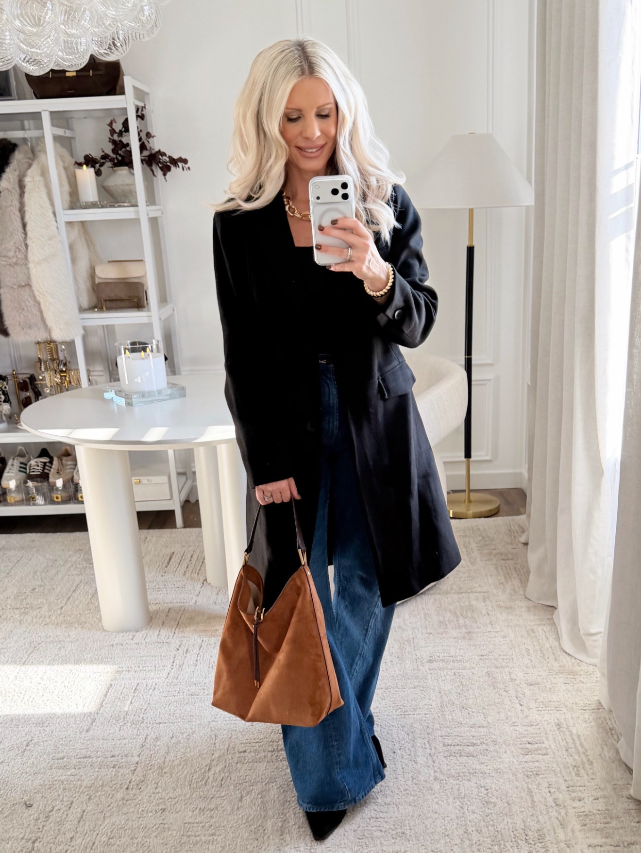 BLACK COAT AND WIDE-LEG DENIM WITH SUEDE BAG. This outfit is one of my favorite elevated neutrals — a tailored black coat layered over a fitted black top with clean wide-leg denim for a long, polished silhouette. I love how the rich suede bag adds warmth and texture, balancing the all-black layers perfectly. It’s an easy, everyday look that feels chic for errands, meetings, or dinner.

#Amazon #TheHillaryStyle #AmazonFashion #NeutralStyle #ChicOutfit #FallAndWinterStyle #ElevatedEssentials #EverydayOutfits #DesignerLookForLess #MinimalWardrobe #PolishedBasics 

 #LTKmomlife #LTKSeasonal #LTKOver40