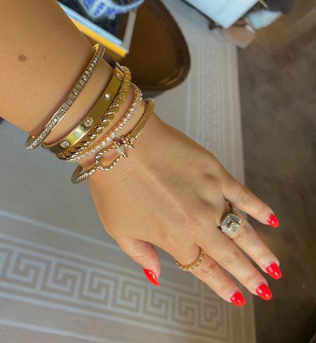 Bracelet stack 
Gold jewelry 


#LTKfindsunder50