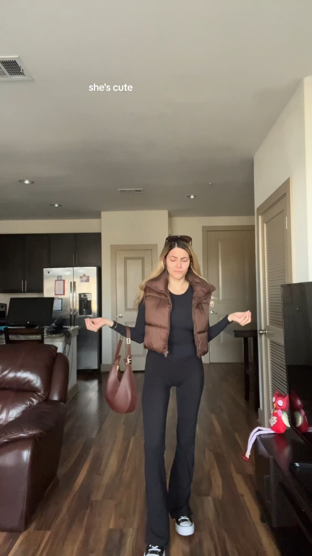 Casual end of winter outfit 🖤🤎I’m wearing a small in top & puffer vest. *Would recommend sizing up 1 if you don’t like the feeling of a shirt being too fitted.



Amazon skims dupe, skims dupe, long sleeve top, black long sleeve shirt, double lined top, brown puffer vest, casual winter outfit, flared leggings, black converse, platform converse 