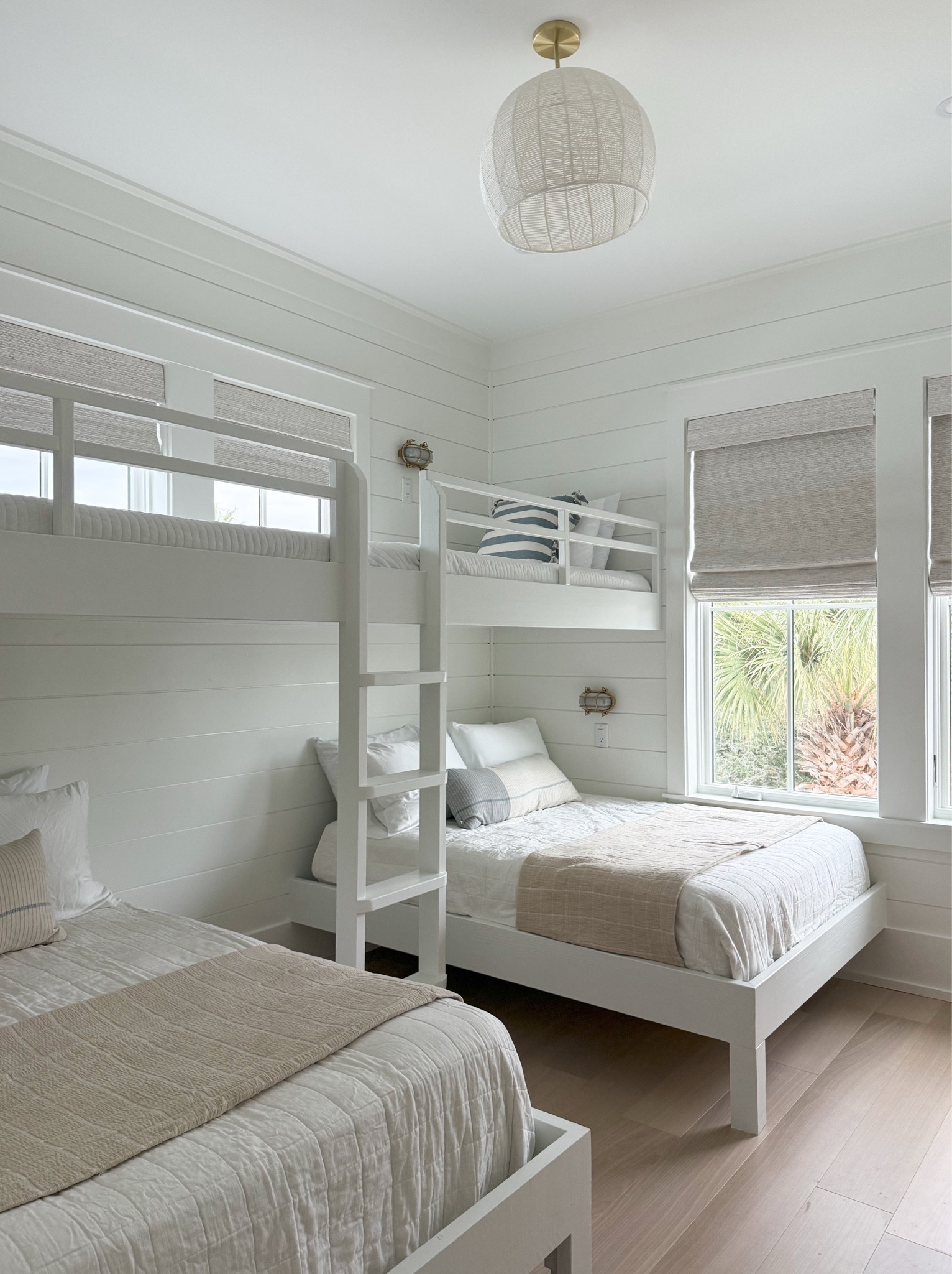 Bunk room sources! Affordable bedding and adorable sconces. Flooring is Shaw castlewood prime turret. Windows treatments were provided by 30A window fashions (called Tranquility) 

#LTKHome