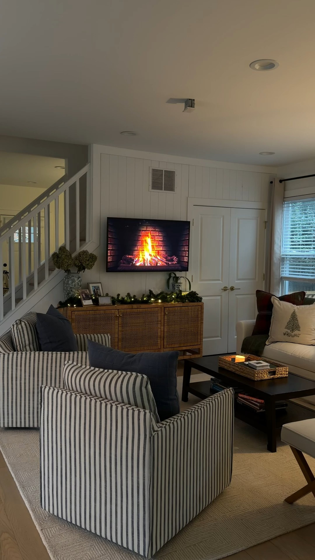 [12/2/25] loving how our living room is transforming ❤️ linking what I can + info:
Couch is from sixpenny, Elias 84”, water Lilly, Polly fill
Coffee table was purchased from a friend 10 years ago, west elm. 
Console frome HomeGoods! 
Tv: frame TV 
Pillows: plaid from this year & tree from last (both target) 
Ottoman stools: Amazon, they’re surprisingly comfortable!! 
Rug: just got from homesense! Unsure if we’ll keep, but it works as of now!!

#LTKHoliday #LTKHome #LTKGiftGuide