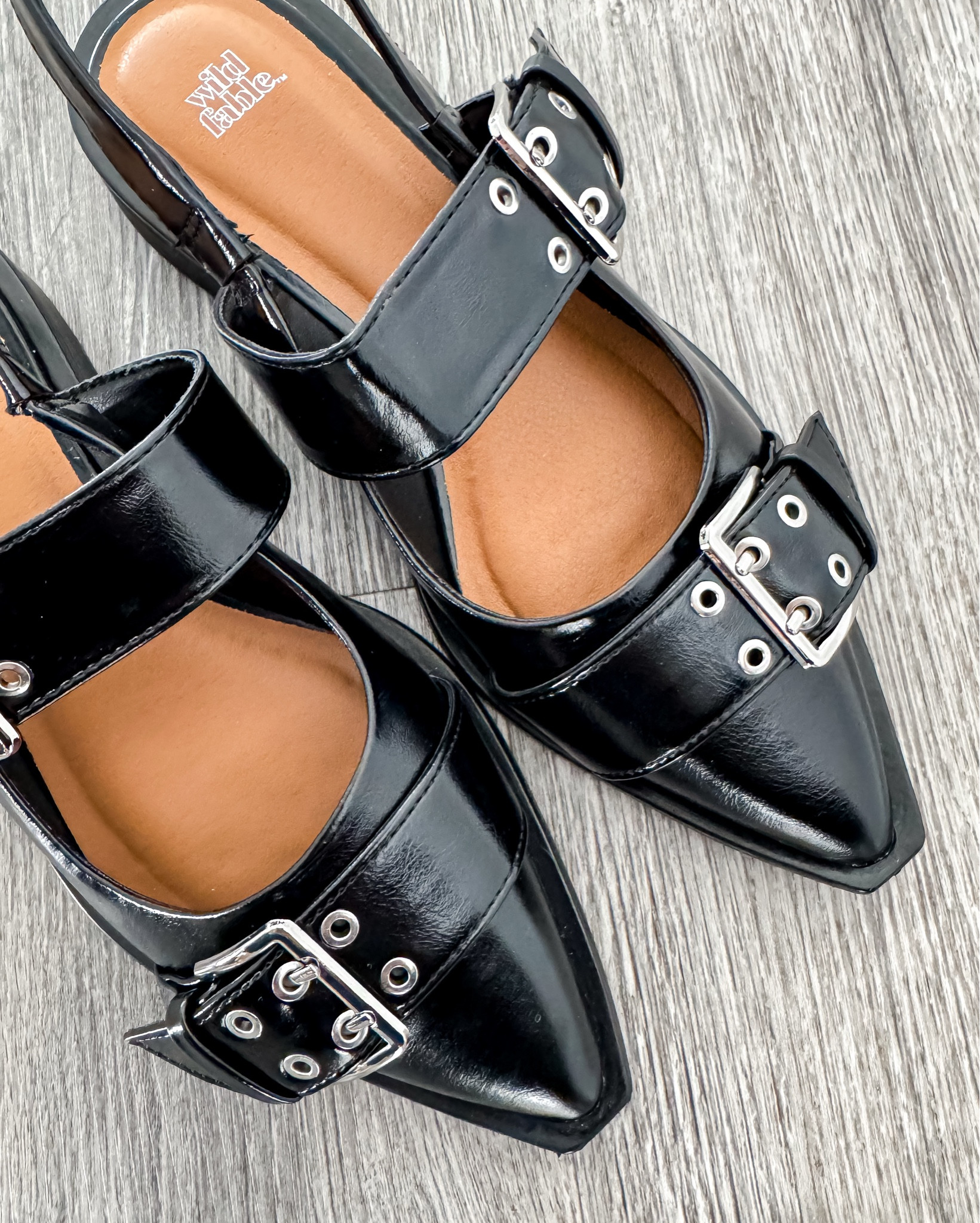 🚨Sale Alert | Under $25
These gorgeous buckled flats are BACK IN STOCK in all sizes and I am screaming because they are my most worn flat! 
Edgy, sleek, and comfy. The perfect combo. The pointed toe instantly elevates any outfit, and the double buckle straps give that chic designer vibe without the designer price. They pair perfectly with denim, trousers, skirts… honestly they make every outfit look cooler. If you’ve been waiting for a sign to grab these, this is it. They WILL sell out again. 

Think: everyday wearable, but with a fun fashion-forward twist. Dress them up, dress them down, wear them to brunch, errands, date night, or holiday events. They’re that pair you’ll reach for over and over again.

black flats • pointed toe flats • buckle flats • trendy shoes • edgy flats outfit • fall shoes • winter shoes • everyday flats • comfort flats • black mary jane flats • slingback flats • buckle mary janes • affordable trendy shoes • gift ideas for her • outfit details • closet staples • chic neutral style • influencer favorites • shoe addict • edgy style • modern wardrobe #LTKFindsUnder50

#LTKootd #LTKValentine #LTKSaleAlert