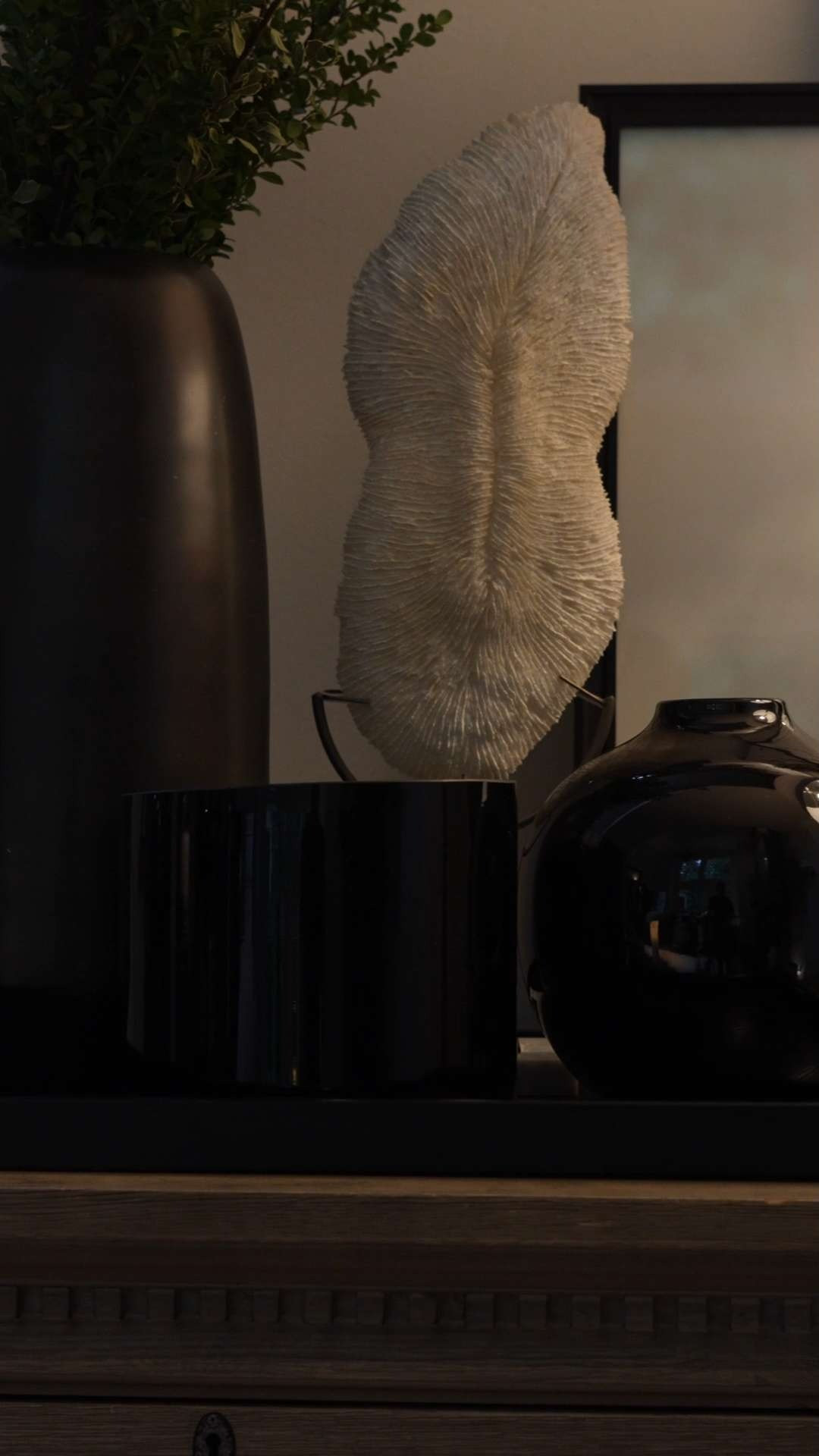 I’m completely in love with this modern minimalist decor setup! The sculptural pieces adds a touch of organic elegance, while the sleek black vases bring bold contrast and depth. It’s the perfect balance of nature and sophistication in my space. I can't wait my eyes off this one!! 

 #LTKSeasonal #LTKHome #LTKStyleTip