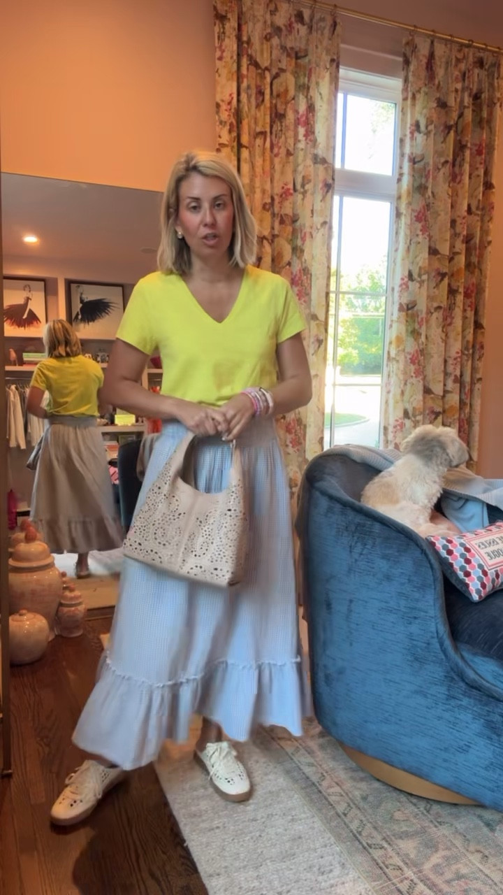 This skirt is the biggest yes! Y’all have seen me wear this with other tops and I’m obsessed. I’ve paired it with my favorite hero tee for a pop of color. Add a statement necklace and done! ￼
Tee & skirt - xs 
Sneaker - 8 tts 
*Use Catherine20 at A+B
*Use CMLP15 at Lilla P

#LTKmomlife #LTKOver40 #LTKdayinmylife