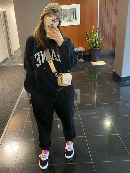 The coziest outfit for fall mom uniform! Love these flattering sweatpants from Nike, perfect for curvy girls. Wearing size medium, they run big. Paired with my Nike sneakers, beanie hat and belt bag. Linking similar belt bags I love  

#LTKshoecrush #LTKitbag #LTKcurves