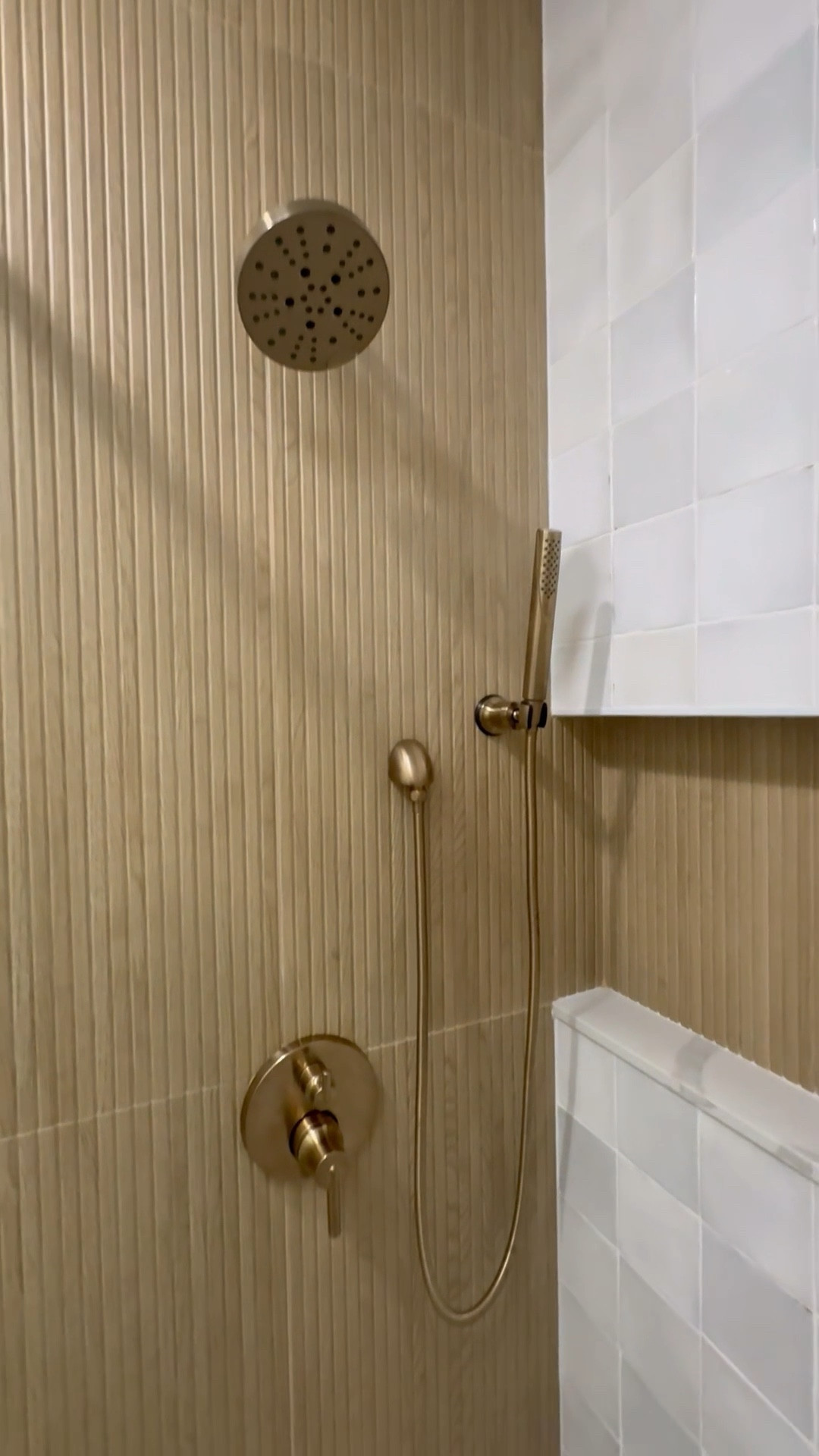 Bathroom, remodel, ideas, wood look tile, neutral, bathroom, remodel, champagne bronze, bathroom, fixtures, showerhead, shower, wand, handheld, shower, head, handheld shower wand, side, bar, Delta, champagne, bronze, champagne, bronze, knobs, bath, towel, hooks, Schlage, toilet paper holder, trending bathroom ideas zellige inspired tile square tile square backsplash 

#LTKHome