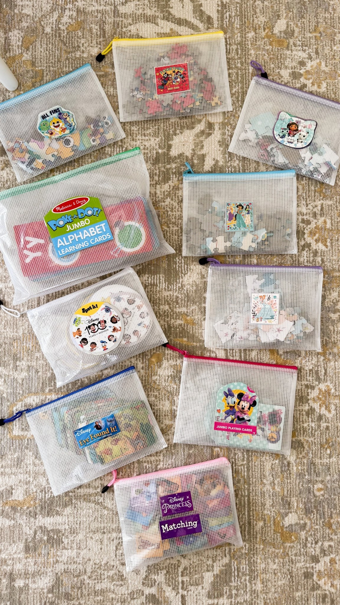 Kids games and puzzles organization using mesh pouches! It was hard to let go of the pretty boxes but I'm so glad I did this and it saves so much space! 

Zipper pouch, puzzles for kids, spot it Disney card game, Melissa and Doug alphabet learning cards, storage combination with boxes, Disney eye found it and princess matching game, mesh pouches, playroom storage 

#LTKKids #LTKSeasonal #LTKHome