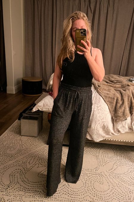 I’ve been sick all week and let me tell you these $19 pants I’ve been wearing are so freaking comfortable (super lightweight and soft)!  I just bought another pair.  I also have about six of these tanks (they come in different colors and styles).  They are so versatile.  I wear them to bed or under a blazer for date night.  So good! 🙌🏽

Size info: Pants- Medium // Tank- Small 

#LTKstyletip #LTKfindsunder50