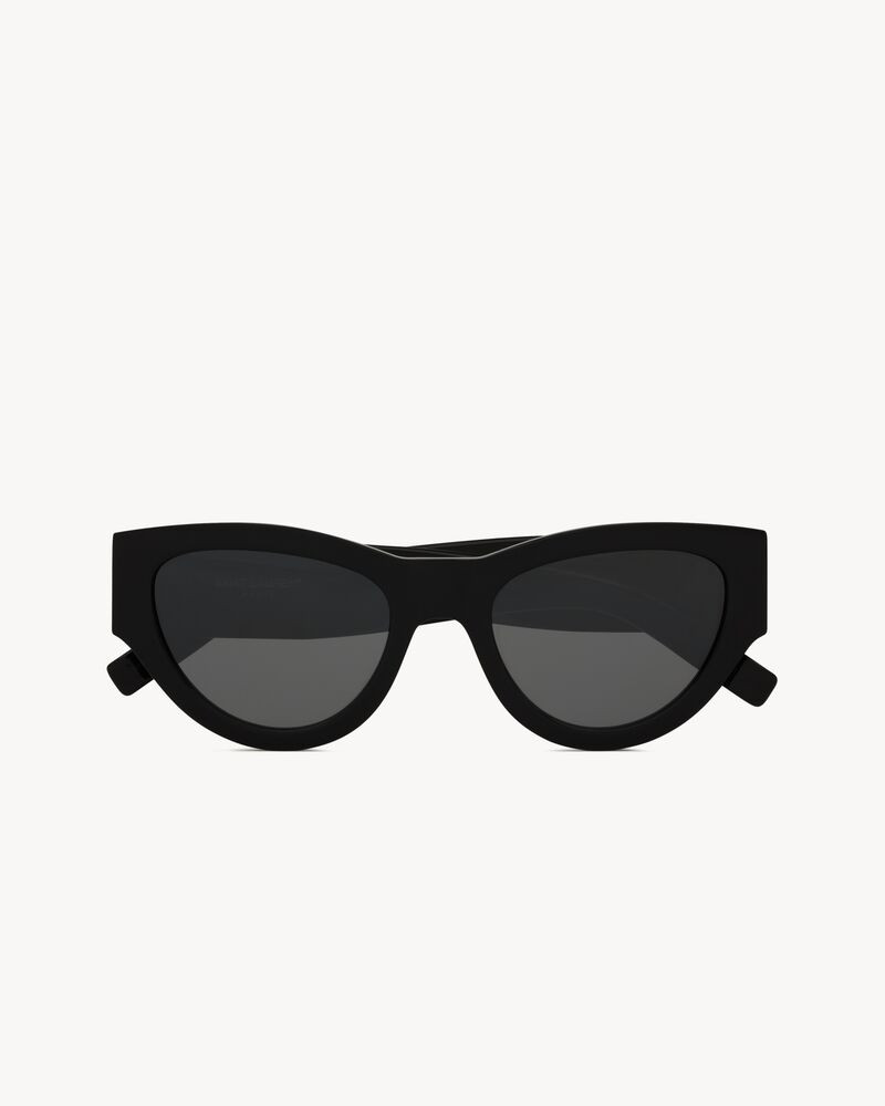 Sunglasses with thick acetate frames and nylon lenses, featuring the CASSANDRE on the temples. | Saint Laurent Inc. (Global)