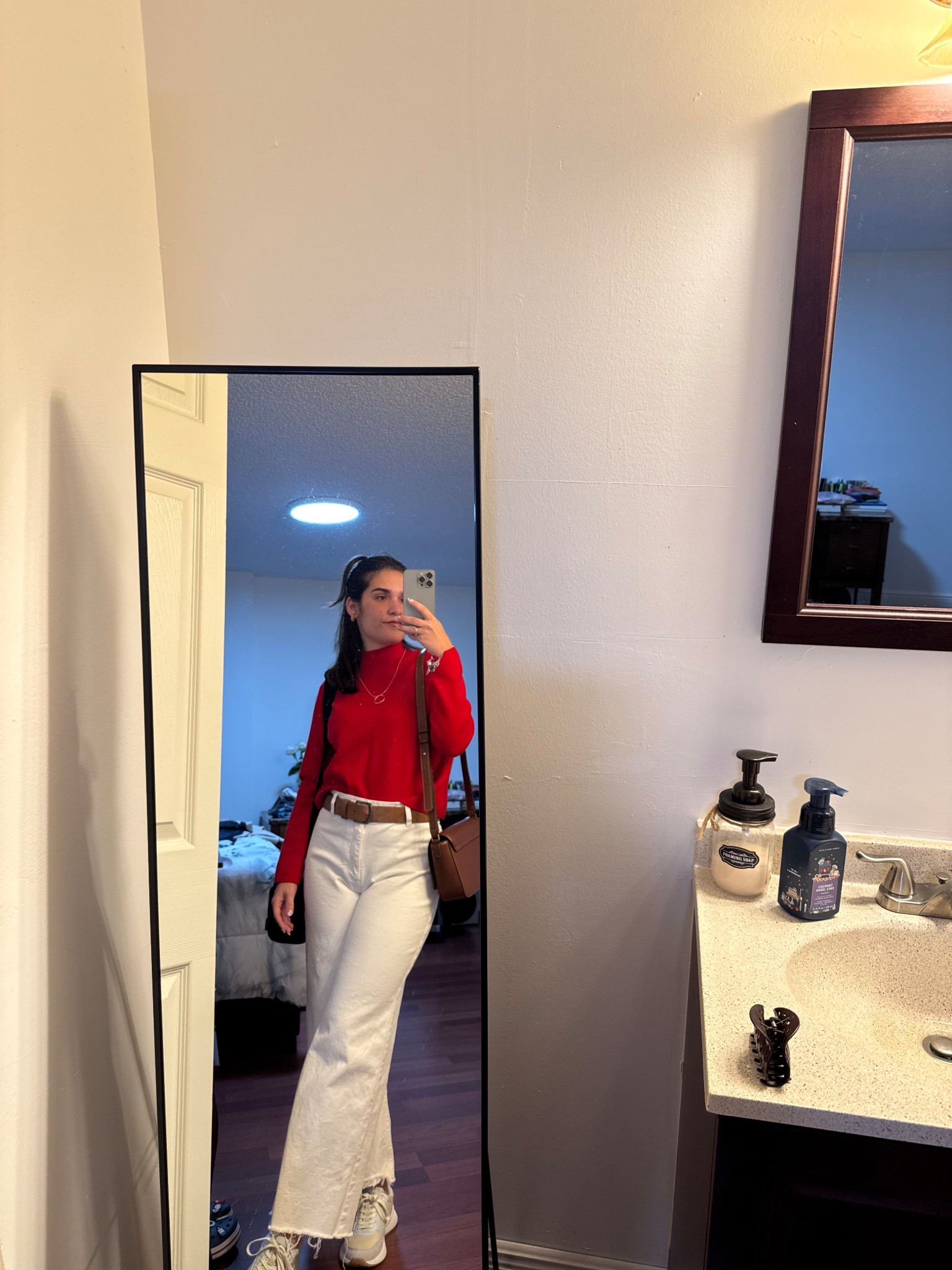 The outfit is honestly perfect for winter vibes. ❤️‍🔥

✨ The red sweater – bold, warm, and super flattering on you.
✨ White wide-leg pants – they keep the look clean, classy, and modern.
✨ Brown belt + crossbody bag – great contrast, pulls the whole outfit together.
✨ Sneakers – comfy but still chic.
✨ Part of the hair up – gives the look a polished, effortless feel.



#LTKCyberWeek #LTKootd #LTKSaleAlert