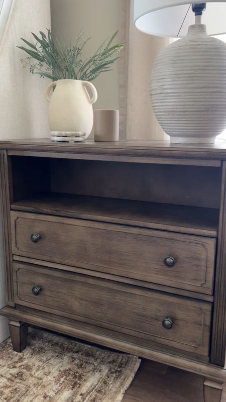 Absolutely loving our new nightstands!!! Two drawers and open space for storage. Also has USB / outlets hidden on back of nightstand! 

Nightstand, bedroom, two drawer nightstand, area rug, neutral area rug, lamp, table lamp, vase, home decor, shelf decor, table decor, neutral decor, Amazon home, Amazon finds 

#LTKHome #LTKSaleAlert #LTKFindsUnder100