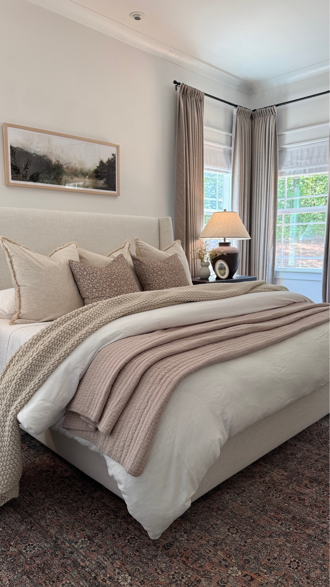 Our layered bedding is so cozy and calming 🤍 The wall art above our bed is one of my favorites — such a pretty landscape piece! I love how this room has come together. 🙌🏻

#LTKHome