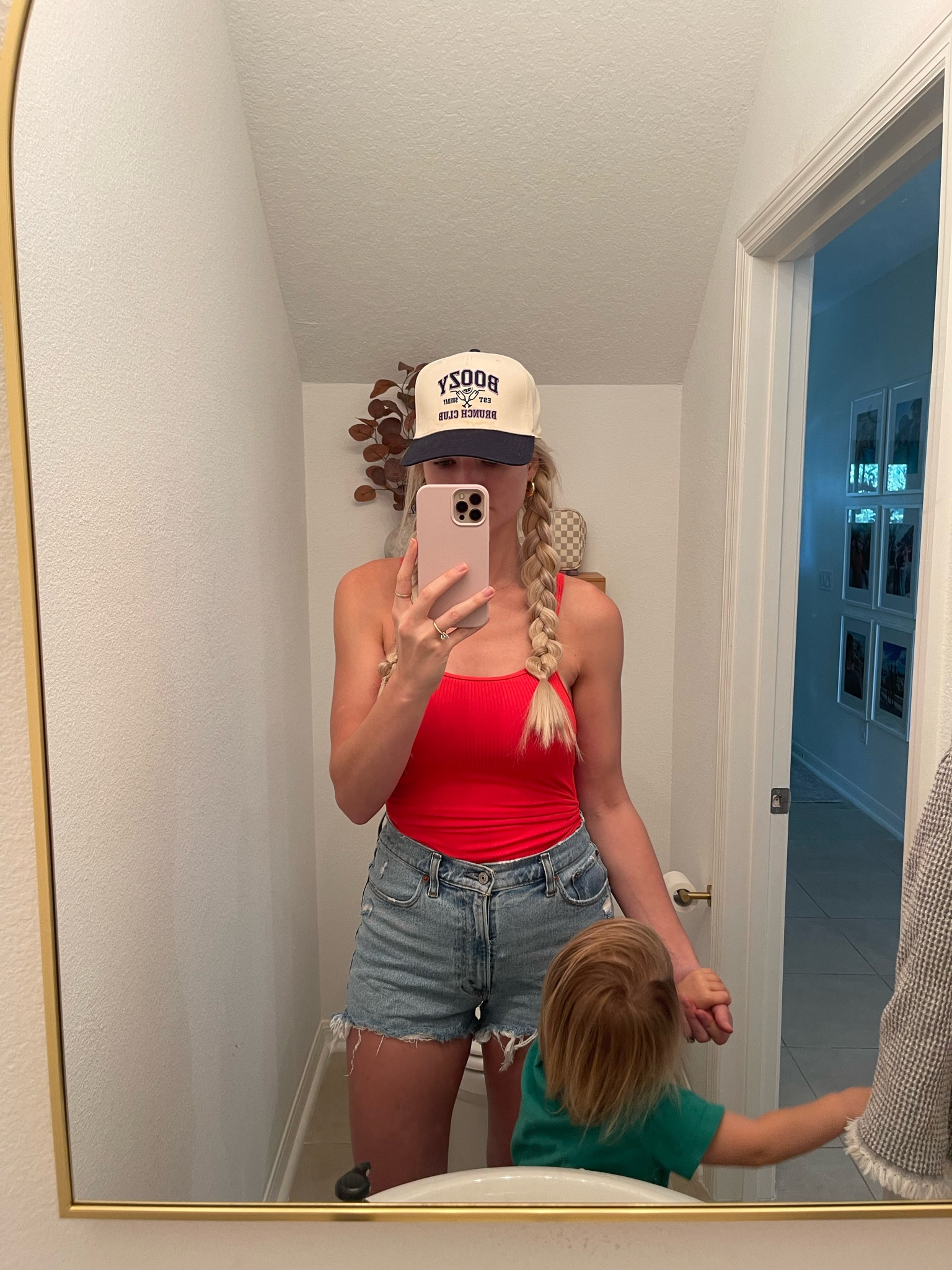 Pool day outfit. Favorite Amazon one piece this year! Wearing size small- size down. Has adjustable ties to make the leg higher or lower. Abercrombie shorts size 27curve love. 

4th of July, memorial day, red swimsuit, one piece swimsuit, trucker hat, jean shorts, summer outfit, vacation outfit, abercrombie shorts