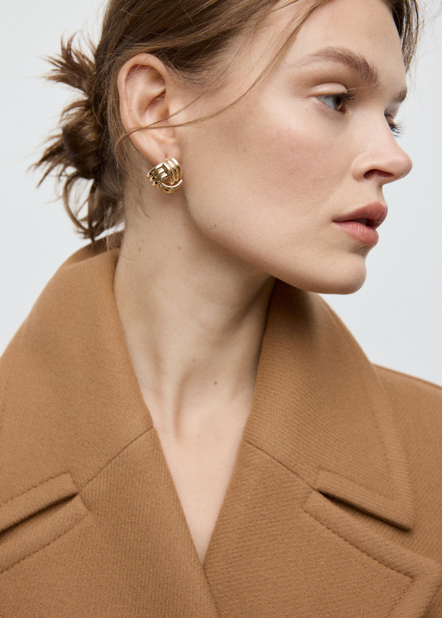 Intertwined knot earrings | Mango (US/MX/AU)