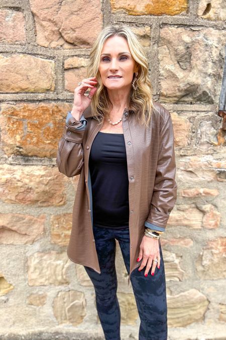 Happy Sunday friends. We had a fun date night in Oklahoma for a concert last night. Today was a travel day & I wore this faux leather shacket from @express for the trip home. #expresspartner It’s a jacket you can dress up or down & provides plenty of warmth when layered over a top. Shop now for 4️⃣0️⃣% off everything. #expressyou  #December2022 I’m loving the faux leather trend, aren’t you? #monicasmixx 

#LTKsalealert #LTKunder100