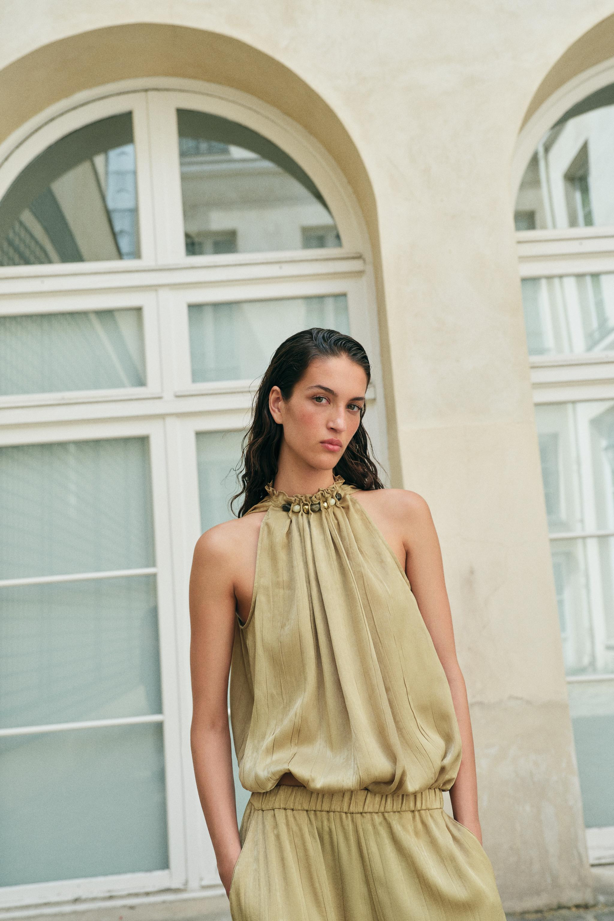 Gathered collar top with bead embellishments. Sleeveless. Balloon hem with interior elastic. Back... | Zara US