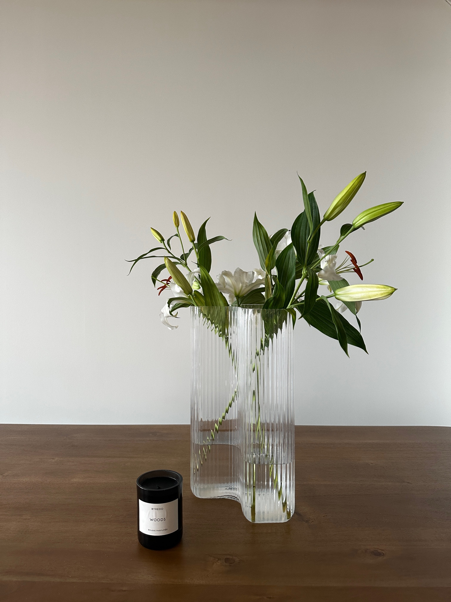 Ribbed nesting vase 

Diptyque candle 

World market table 

#LTKFind #LTKhome #LTKunder100