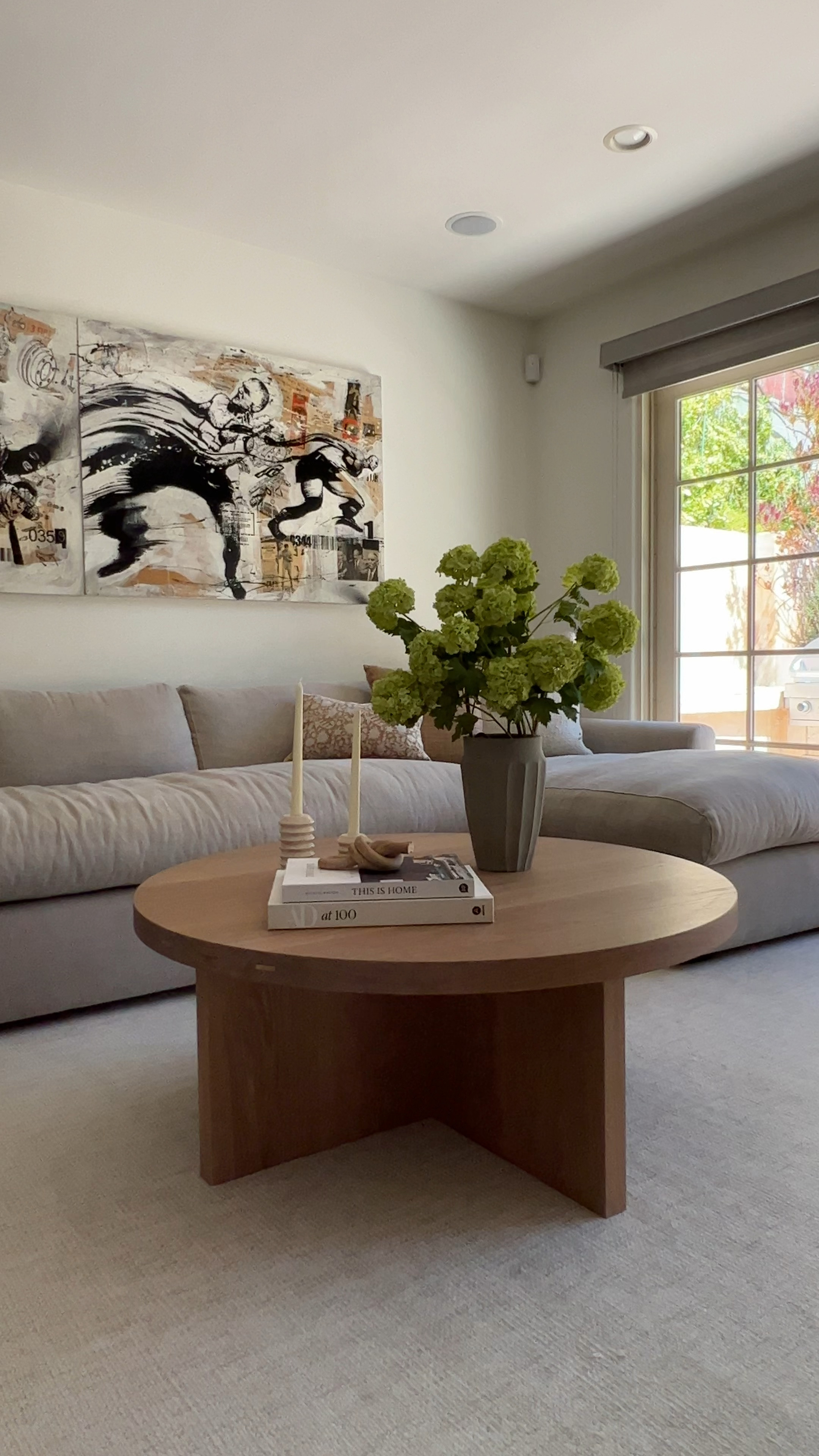 Living room decor. candlesticks pink candles mauve candles wood coffee table faux green branches snowball flowers vintage pillows, neutral, pillows, gray vase, coffee, table, books, brown pillow, camel pillow crate & barrel McGee and co Amazon Danielle Oakey pillow shop 

#LTKfindsunder100 #LTKhome #LTKfindsunder50