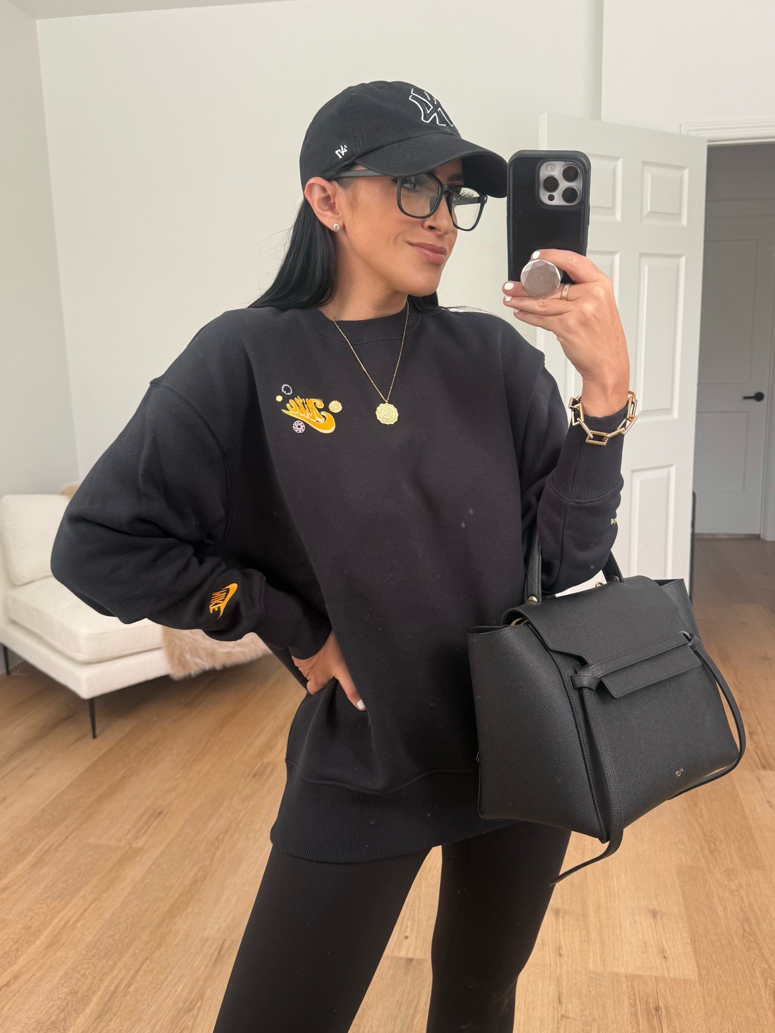 Nike Sportswear Phoenix Fleece wearing size small. Spanx Booty Boost leggings