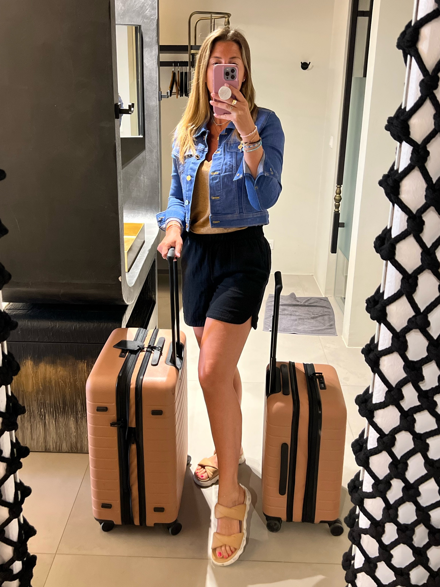 My summer travel staples includes cotton gauze shorts, a denim jacket and this luggage! The design and details are 🤌🏻

Love that this denim jacket has gold buttons for a more elevated look. Runs TTS.

My shorts are sold out in black but available in other colors (and on mega sale). Also linked some similar options I love. 

#LTKTravel #LTKStyleTip #LTKOver40