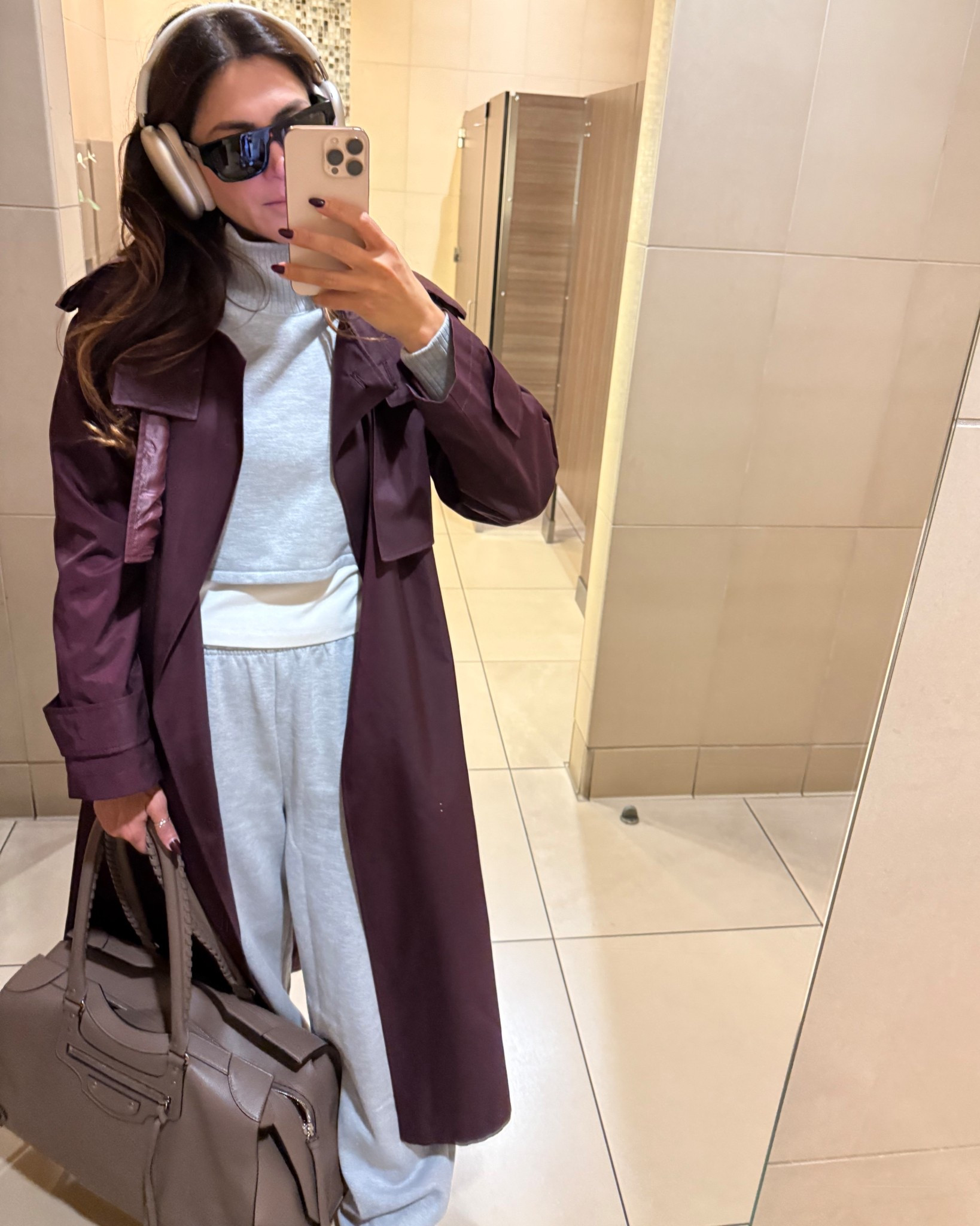 Travel fit check 🧳

Proof you can travel comfy and look put together ✈️ Wearing my favorite affordable trench with Alo sweats!  

#LTKSeasonal #LTKStyleTip #LTKTravel