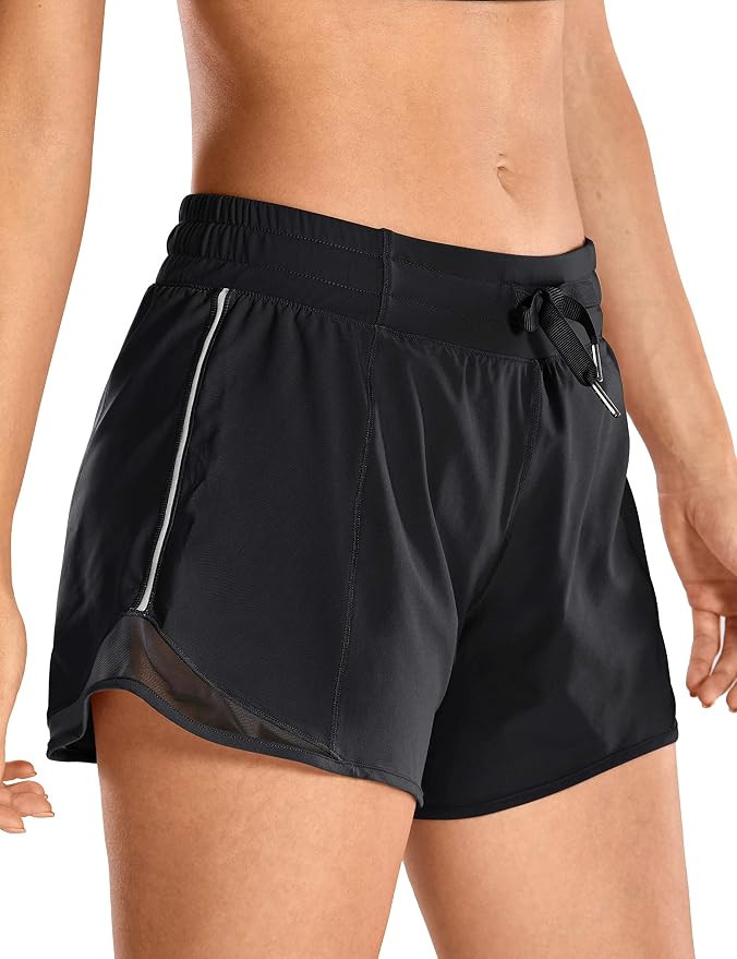 CRZ YOGA Quick-Dry Loose Running Shorts Women Sports Workout Shorts Gym Athletic Shorts with Pock... | Amazon (US)