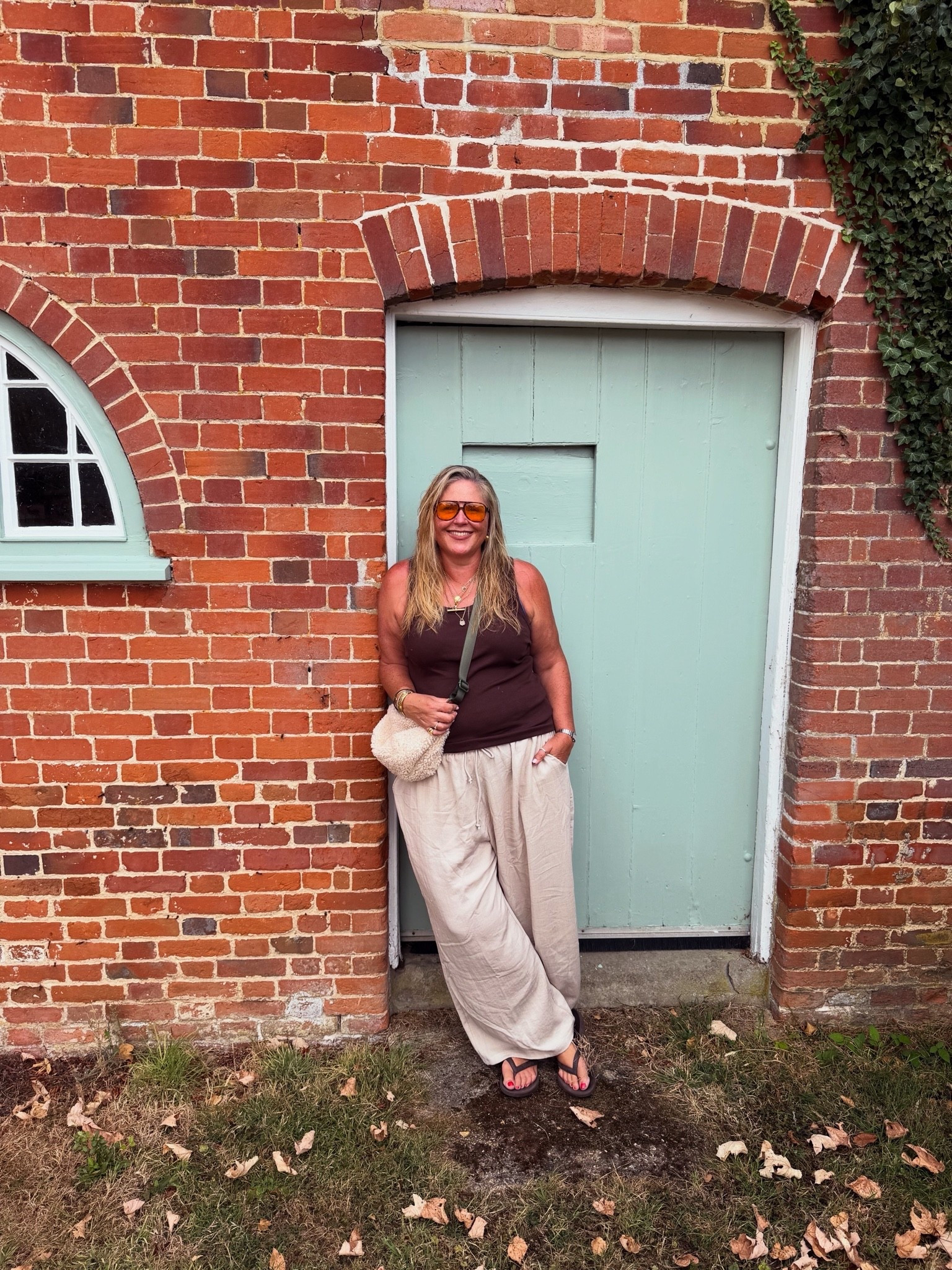 Wide leg trousers, brown vest, fluffy bag, brown flip flops, sunglasses

#LTKsummer #LTKautumn #LTKplussize