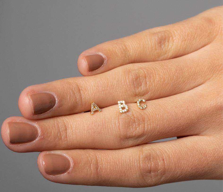 Mini initial earrings 

#LTKbeauty #LTKstyletip #LTKGiftGuide