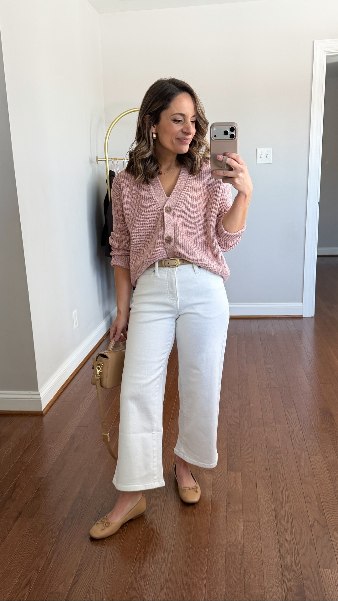 Cropped white jeans for spring! I shared these jeans in the standard length in a salmon color but here they are in petite. The standard has a 27” inseam and petite has a 25” inseam. 

Jeans: petite 24 - 25” inseam. True to size but they stretch with wear. 
Sweater:xs 
Shoes: tts 

#LTKPetite