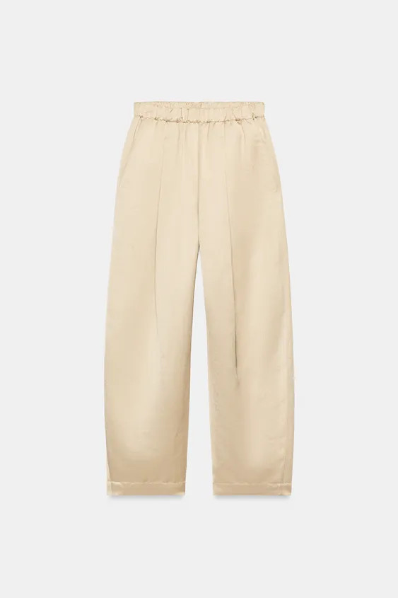 ZARA WOMAN COLLECTIONTrousers made from a 24% linen blend yarn. Featuring a mid-waist and an elas... | Zara NL