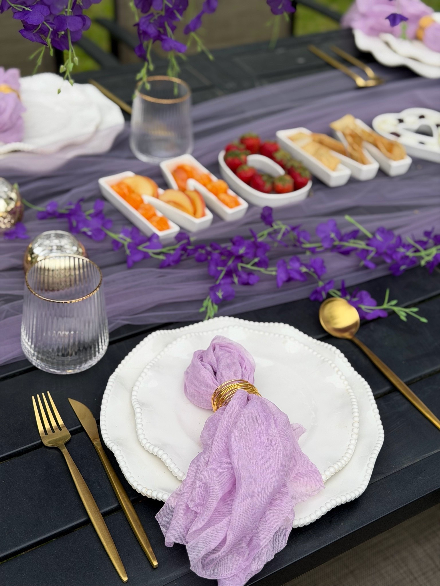 To complement the florals, I set the table with spring-inspired plates. Gold flatware ties everything together so effortlessly, and these timeless wine glasses—with the gold rim—add the perfect touch of shine. Lavender cloth napkins with gold napkin rings finish each place setting so beautifully. #goldflatware #diningtable #tablesetting #diy #patiodiningset #goldflatware #goldplates

#LTKMothersDay #LTKHome #LTKSeasonal