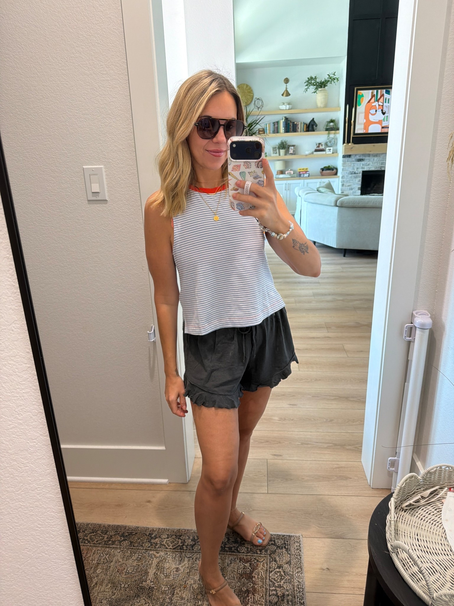 Loopy code: wifeonadime 
Both the tank and the shorts are my true size small! Crocs sandals are also my tru size 8. ￼ I link a few flip-flop charms options.

#LTKdayinmylife #LTKootd
