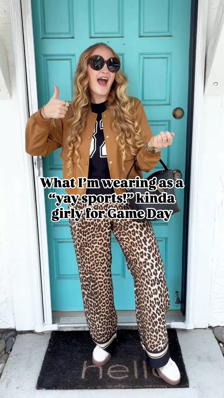 Super Bowl Sunday look 🏈 

Wearing M in pants and bomber jacket, XXL in varsity top (girls sizing) at 150 lbs and 5’7.” Sambae sneakers I sized down one half size from my normal 7.5 to size 7.

game day look, sporty look, game day style, mom style, elevated casual, leopard pants, bomber jacket, varsity tee, sambas, adidas sambas
What to wear | how to style | mom style | trendy outfits | elevated casual | daily looks | affordable fashion

#LTKFindsUnder100 #LTKFindsUnder50 #LTKParties