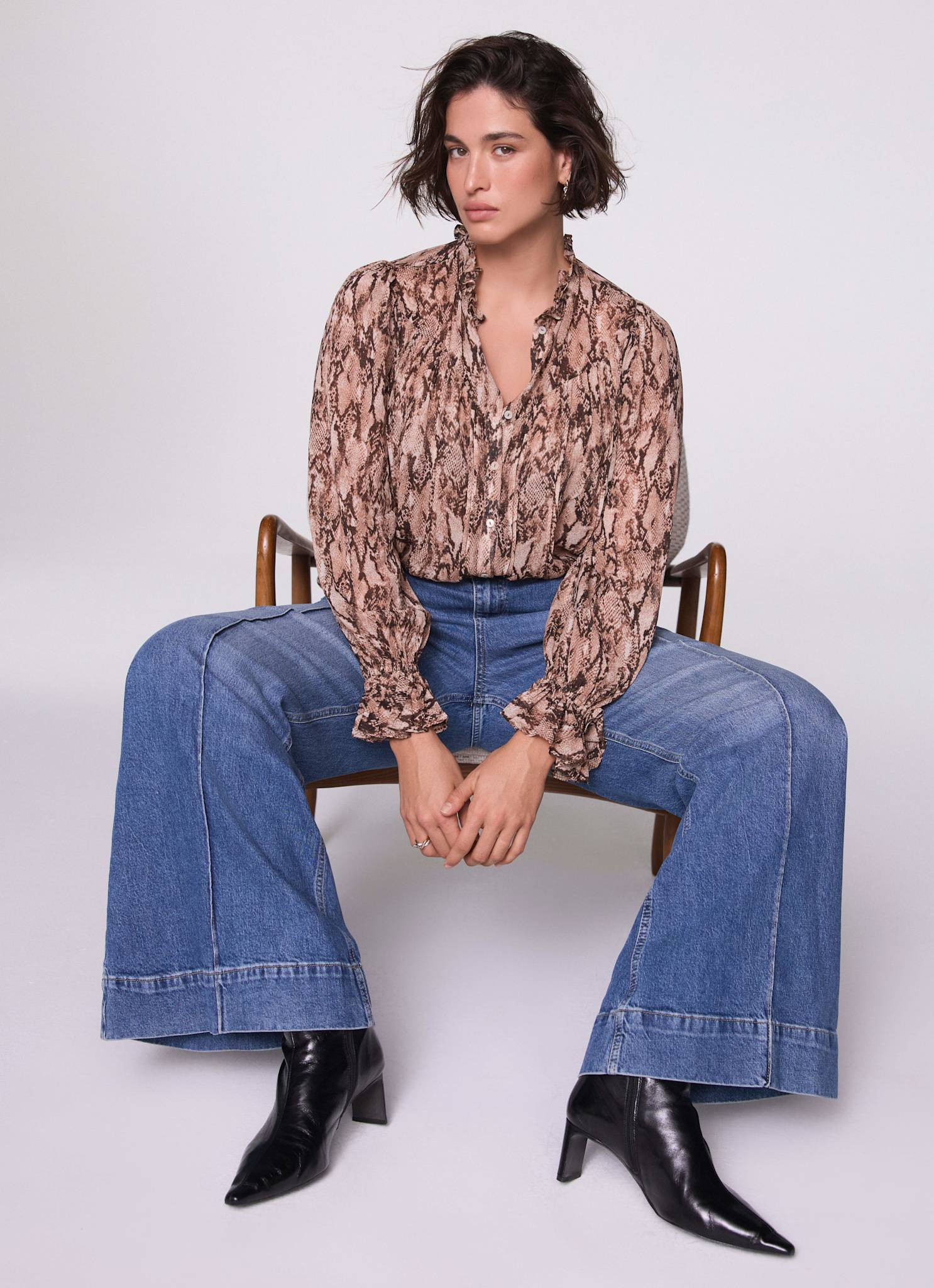 SHOP THE LOOKBrown Snake Print BlouseUS$145.00Colour: BrownSize Guide
  
Choose your sizeChoose y... | Mint Velvet - US