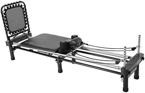 Premier Reformer | 4-Cord Resistance | Cardio Rebounder | Large Elevated Stand | DVDs Included | Amazon (US)