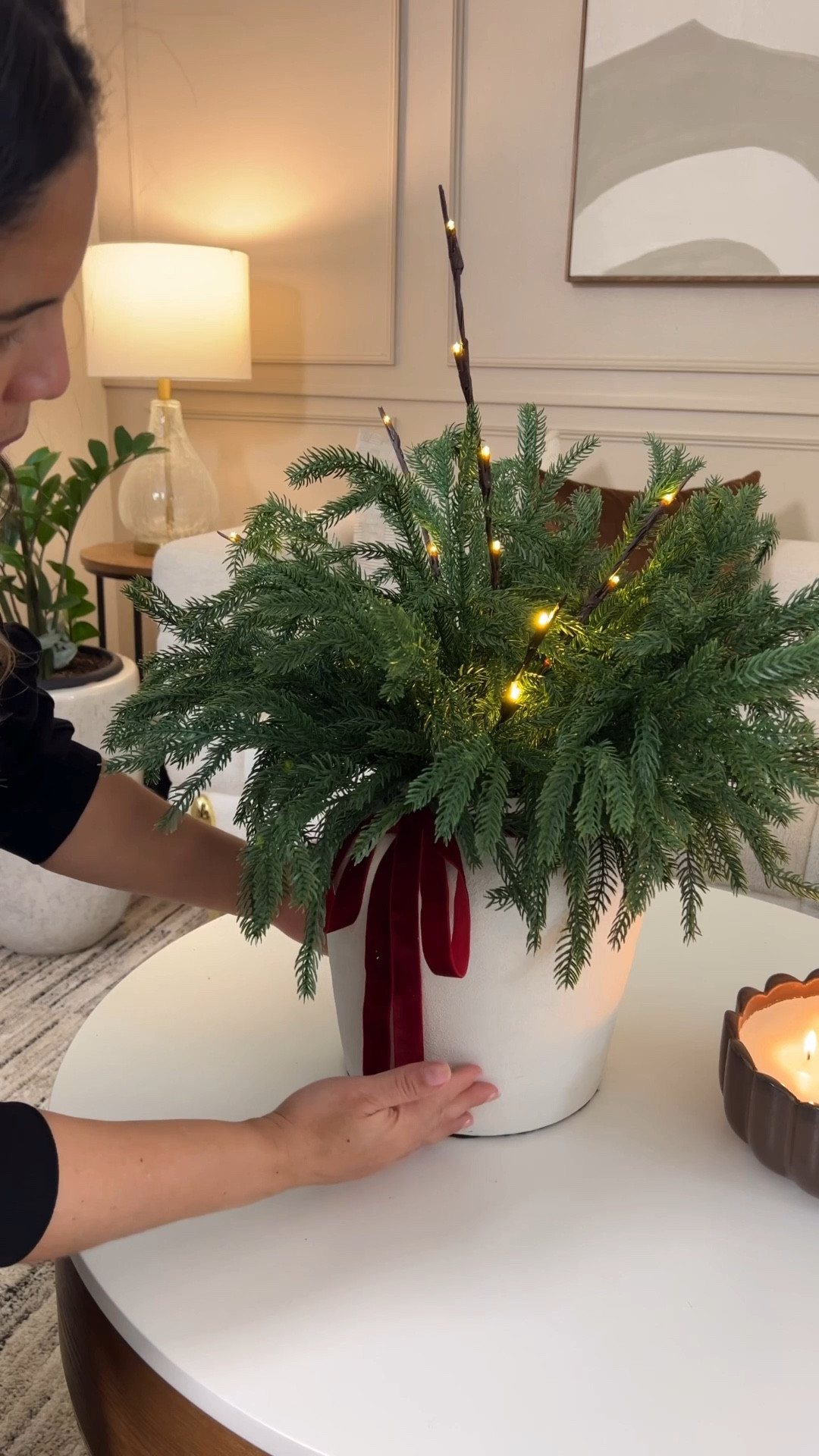 Add a festive touch with these artificial Norfolk pine branches, red velvet ribbon, and lighted branches. Perfect for creating a warm, elegant holiday look. 

Holiday decor, Christmas aesthetic, cozy Christmas home, Amazon home finds



#LTKSeasonal #LTKActive #LTKHome