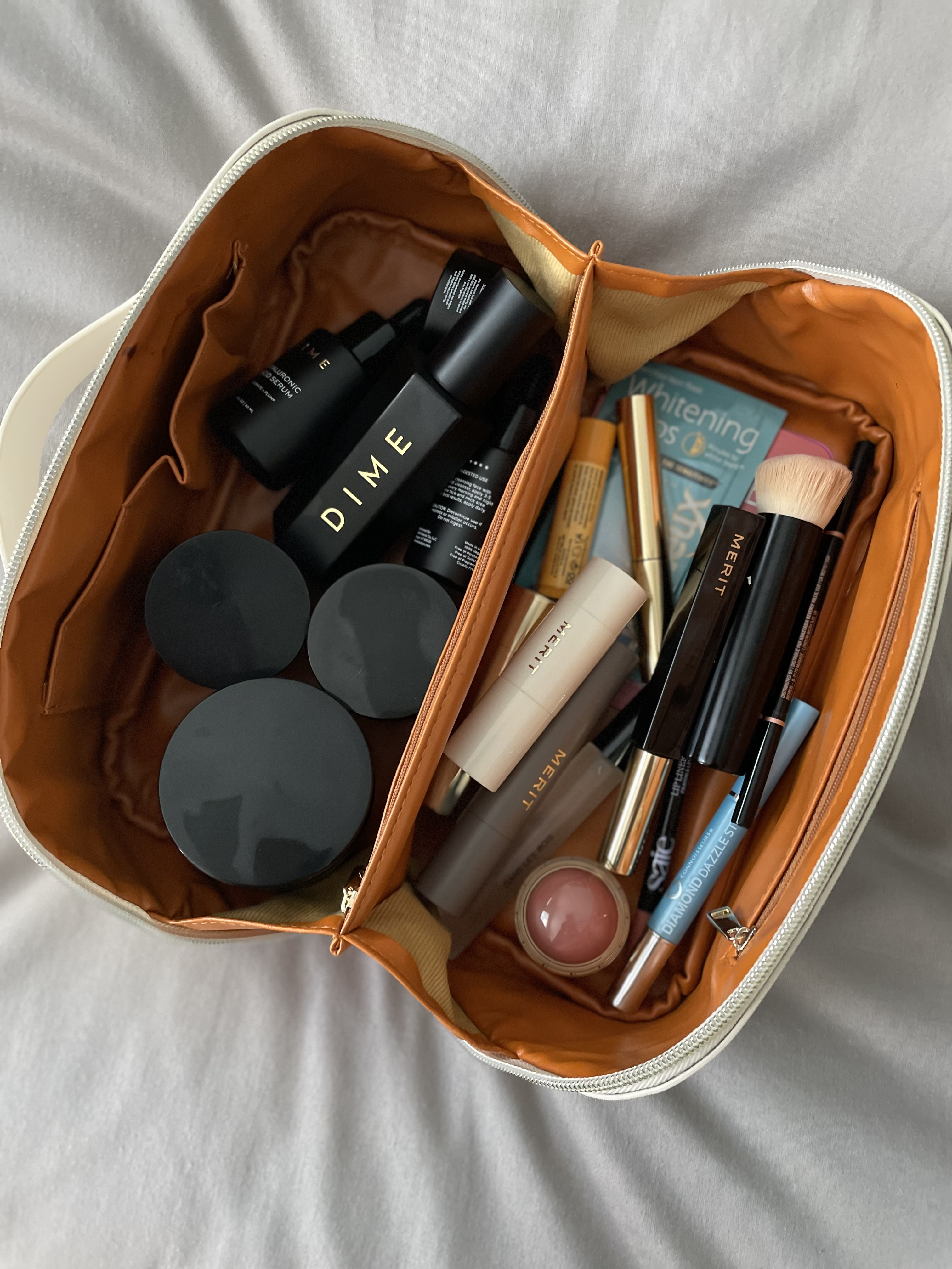 This travel case is perfect for my makeup and skincare! I got this Merit makeup a few months ago and I’m obsessed. So so good! And you all know my DIME beauty obsession 👌🏻

#LTKFindsUnder50 #LTKTravel #LTKBeauty