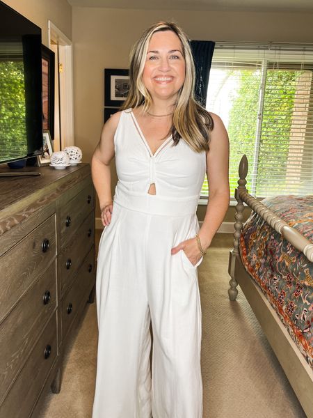 A white jumpsuit is the perfect piece to add to your capsule wardrobe for spring & summer. It’s also part linen which is even better!  The cut outs & cute straps & summer fun detail, but it doesn’t show you much skin. While white just screams summer, it comes in 18 other colors in sizes S-XL. I’m wearing small which fits perfectly. At 5’ the length is great for heels. 
.
.
Chic style, summer & spring looks, backyard entertaining, poolside looks, resort wear, bridal shower, baby shower, white outfits, classic style, 2024 spring fashion, spring capsule wardrobe, 2024 clothing trends for women, grown women outfits, spring 2024 fashion, spring outfits 2024 trends, spring outfits 2024 trends women over 40, spring outfits 2024 trends women over 50, white pants, brunch outfit, summer outfits, summer outfit inspo





#LTKunder50 #LTKtravel #LTKunder100 #LTKOver40 #LTKstyletip #LTKbeauty #LTKTravel #LTKParties #LTKSeasonal