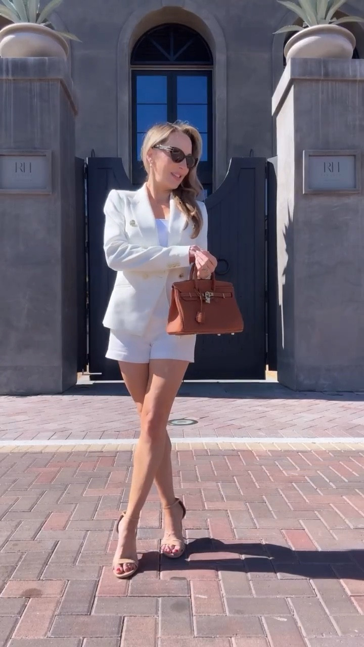 One of my go to outfits for transiting from summer to fall is a white blazer and shorts set. They to me are wardrobe essentials that can be mixed and matching with other shorts and blazers, dressed up or down with everything from sneakers to heels, bodysuits to button downs. 

This season ditch the oversized styles for more flattering and elegant tailored styles you can wear year after year. 

Another wardrobe essential are nude strappy heel sandals for elongating legs and that go with everything. These are by @sarahflint_nyc who are known for their handcrafted classic styles and comfort. Use discount code SF-EVE-15 for 15% off.

#styletips #stylehacks #wardrobebasics #wardrobeessentials #falltrends #ootdreels #fashionreelscreator #karenmillen #sarahflint