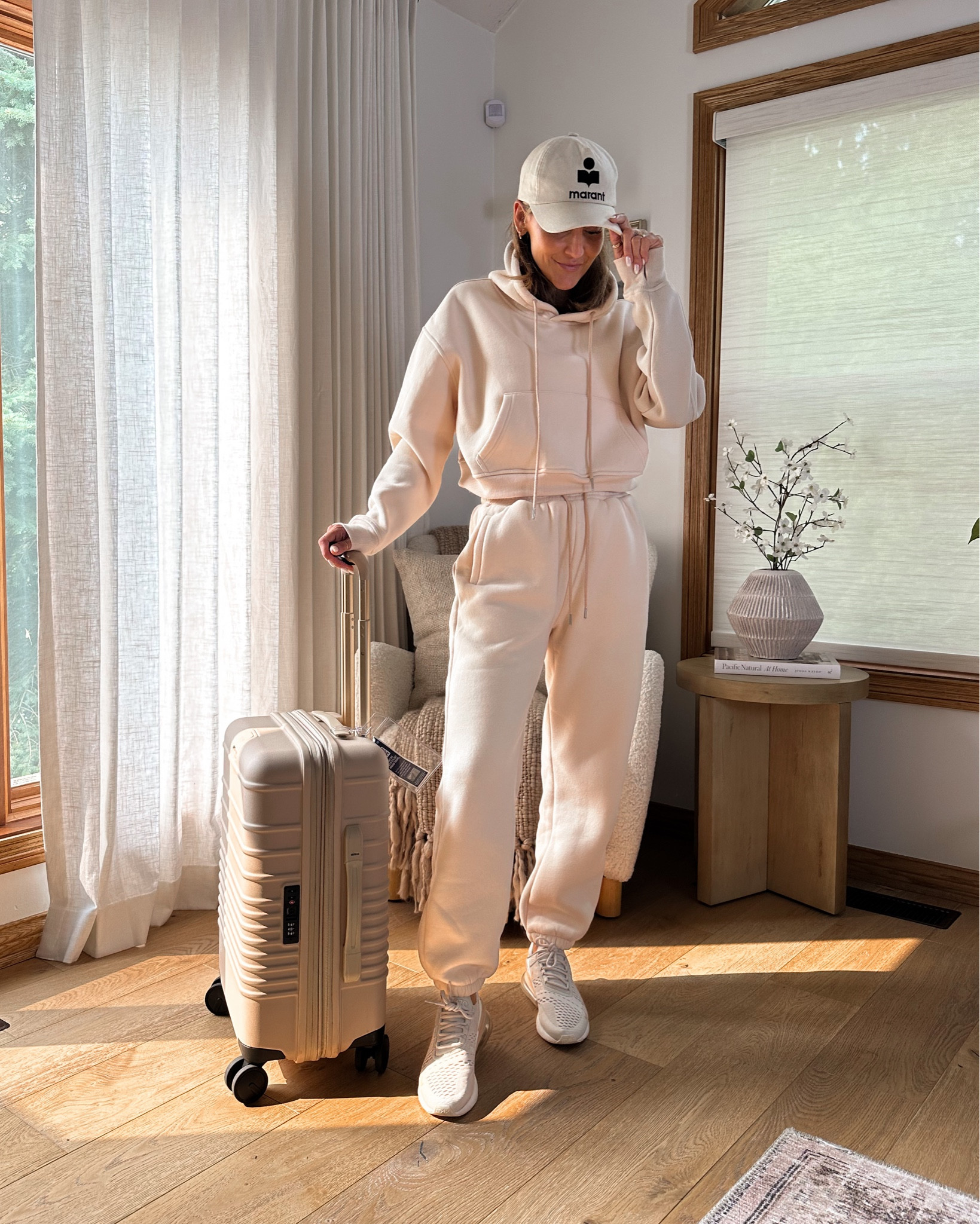 Amazon sweat set premium fleece find! Set sold together under $50 Feels like high end, think and warm set, cropped hoodie fits on a good spot and doesn’t show any skin, pants feature elastic waist and side pockets. Size small color beige 
The perfect Airport outfit worn with a knit tank from Amazon also for when it gets warm! 

#LTKtravel #LTKstyletip #LTKunder50