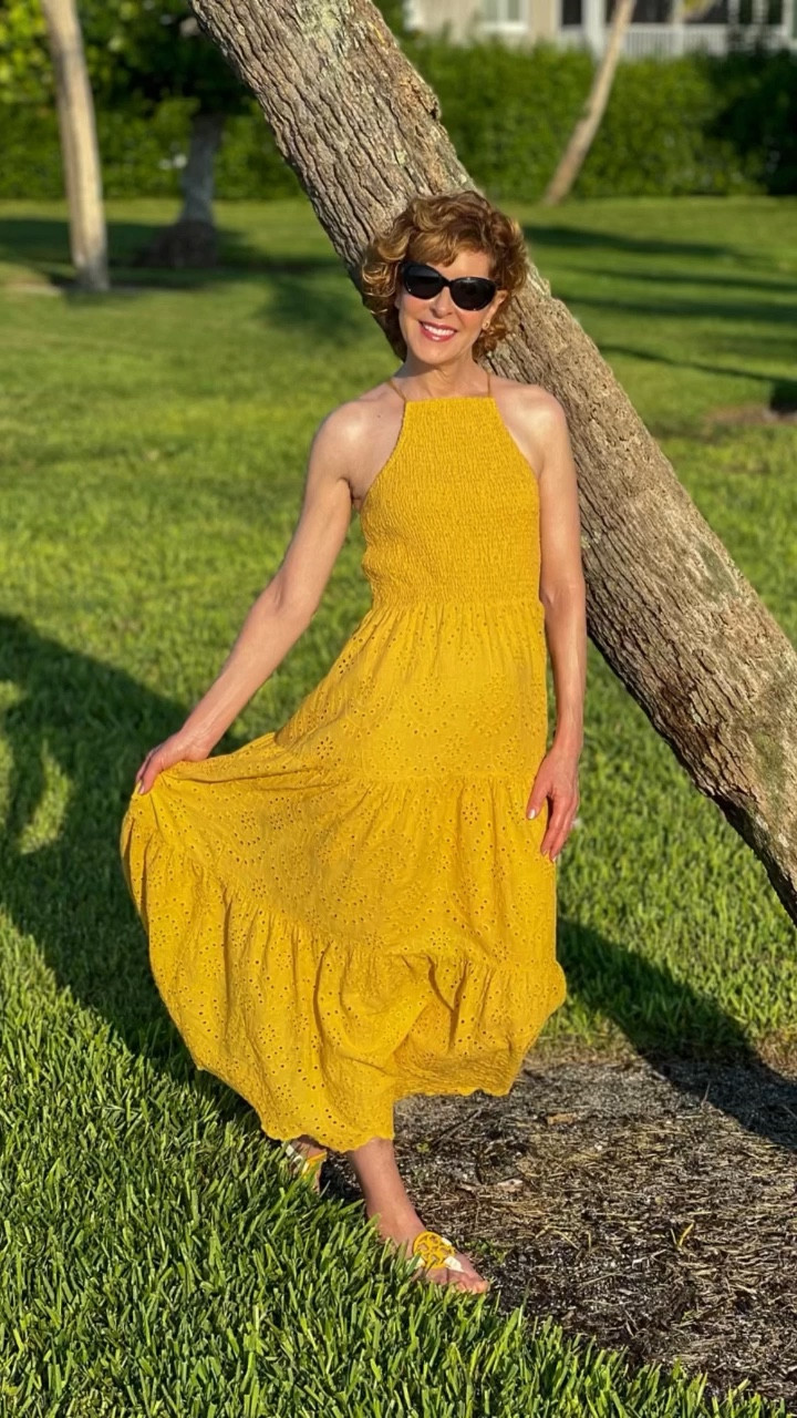 Fall dress, eyelet dress, midi dress, maxi dress, gold dress, yellow dress, halter top dress, gold sandals, yellow sandals, green sandals, gameday look, tory Burch earrings

This eyelet dress is so special! It has a flattering halter neckline and a long maxi skirt. (The XS is ankle
length on my 5’5” frame.) I paired it with Tory Burch Miller sandals in green and gold and Tory Burch crystal embellished logo earrings.

This dress would be beautiful for a fall wedding. Add a beautiful wrap or cardigan and heels and you’re good to go!

#LTKSeasonal #LTKtravel #LTKunder50