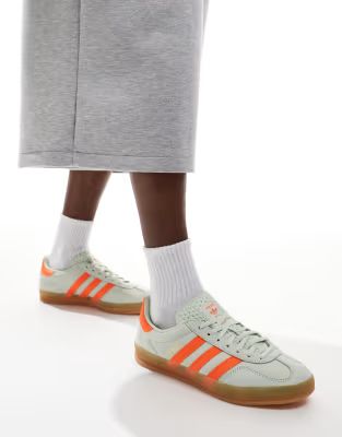 adidas Originals Gazelle Indoor trainers in light green and orange with gum sole | ASOS (Global)