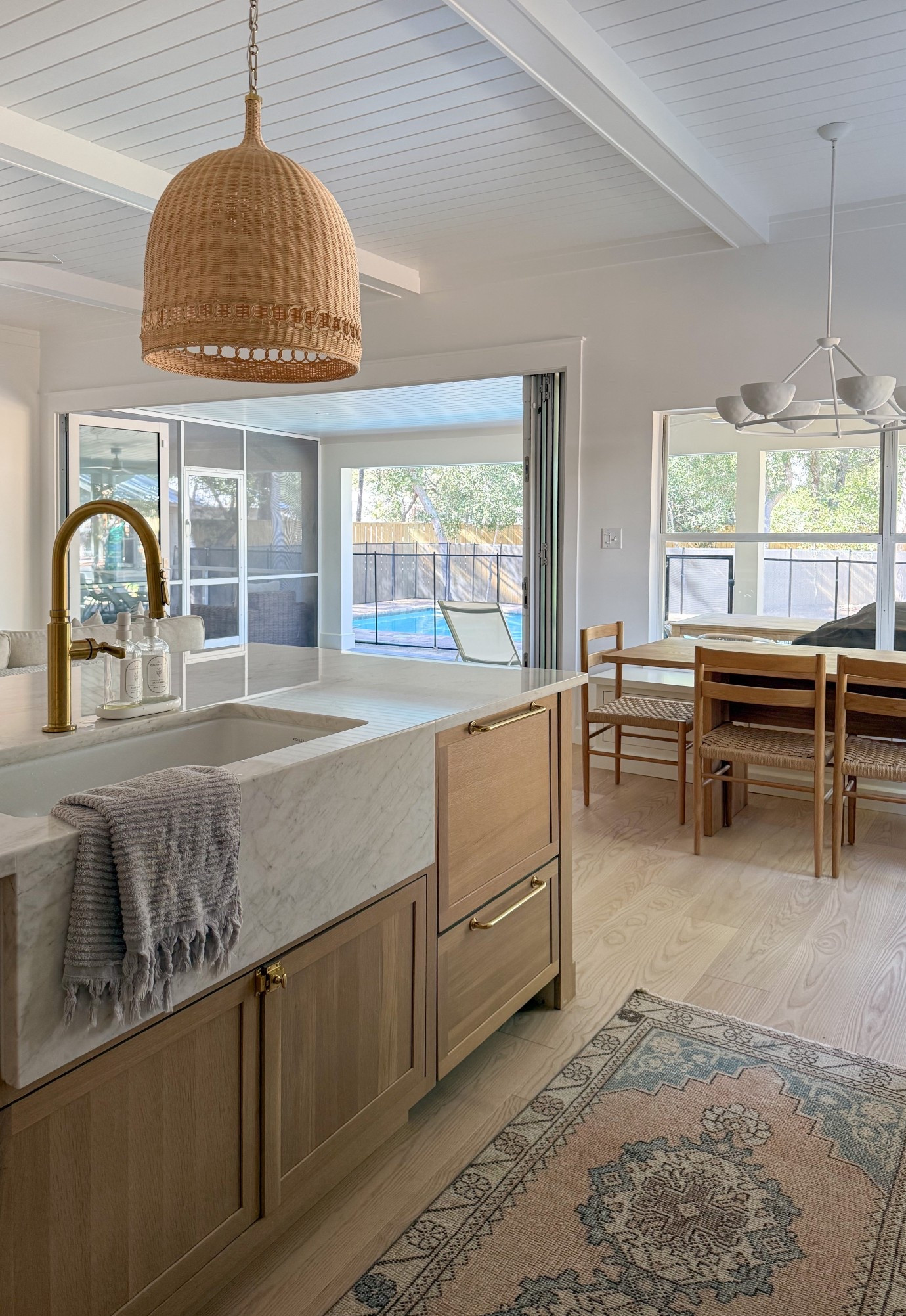 My favorite coastal pendants are $600 off during SL’s biggest sale of the year! We have the larger size. Love how much warmth they add to this beach house kitchen! 🌴

#LTKHome
