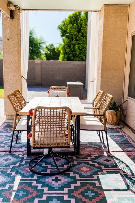 Outdoor living/dining space. Outdoor patio furniture, outdoor curtains and washable outdoor patio rugs.

#LTKhome
