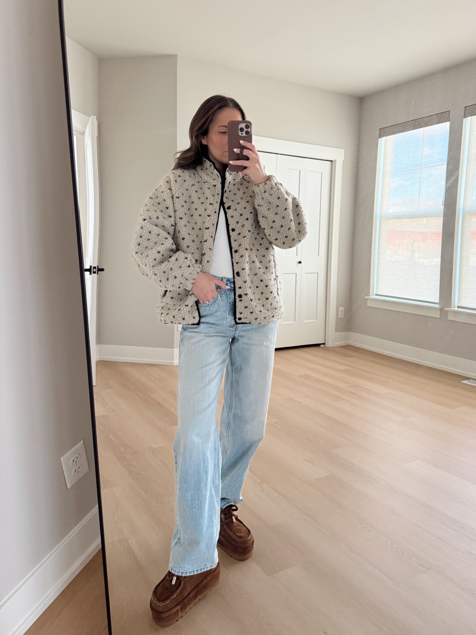 OOTD🤍 this fleece is the best Amazon find! I love the high neck and the snap buttons, but the best part is the print! Wearing a size small and size 0 denim (a target find!)

Casual outfit | mom style | fleece jacket | look for less | outfit idea 

#LTKmomlife #LTKootd